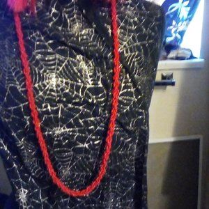 twisted triple strand red bead necklace